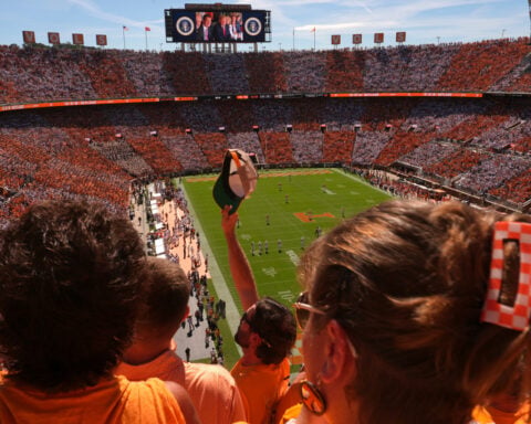 Trump attends Texas-Tennessee game with no apparent disruption to coaches' communications