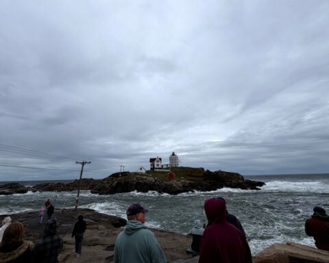 A persistent nor'easter batters US Northeast, causing coastal flooding, outages and at least 1 death