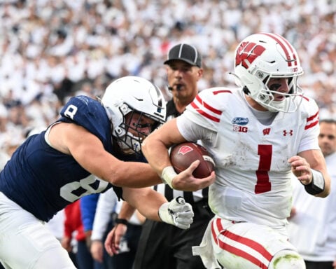 Wisconsin scores twice in last 4 minutes, rallies to beat No. 13 Penn State 24-20