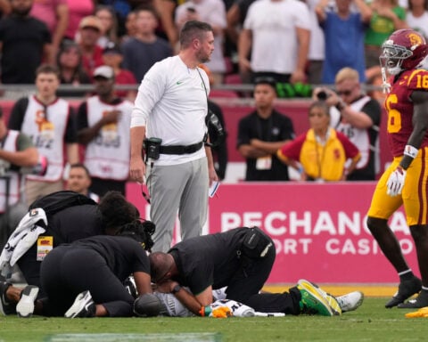 Oregon QB Dante Moore leaves field in ambulance after late hit. His Ducks rally for a stirring win