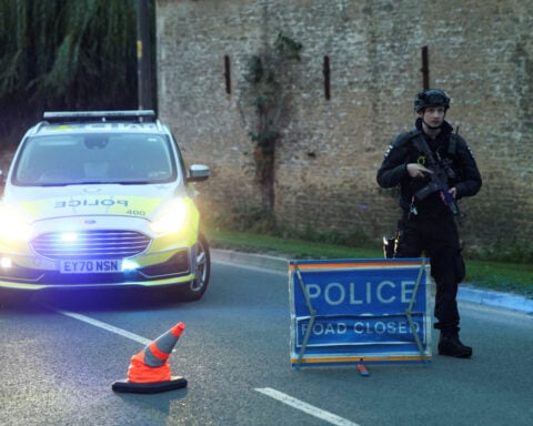 UK police arrest 5 by air base under terrorism act