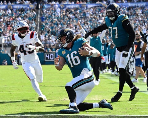 Lawrence throws 3 TD passes as Jaguars rout Patriots and raise more questions about Maye