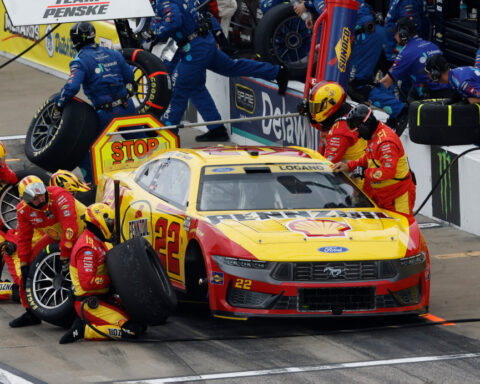 Kyle Larson passes Chase Briscoe with 7 laps left to win for the fourth time at Kansas Speedway