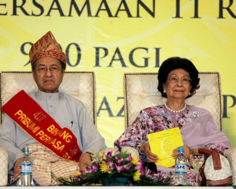 Wife of Malaysia's longest-serving PM Mahathir dies at 100
