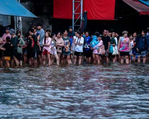 Thousands huddle in Bangkok shelters as Thai flood damages seen at over $320 million