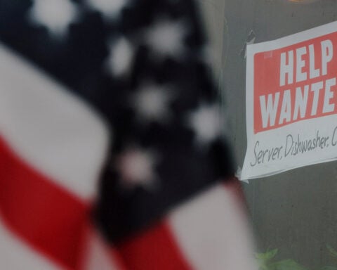 US job openings fall in August; layoffs remain low