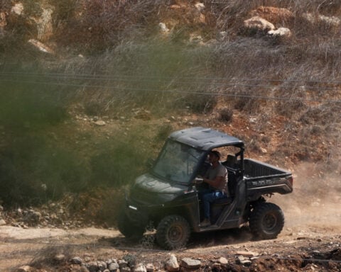 Israeli settlers attack West Bank village, blocking family's return home