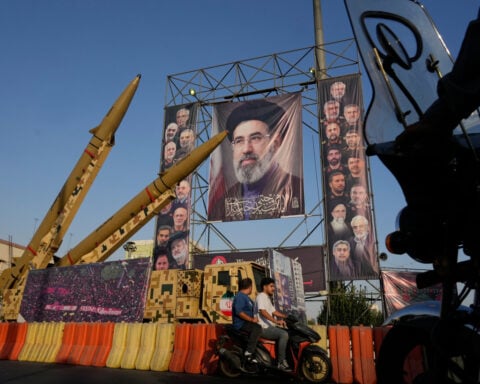 Iran's currency hits a new record low as war erodes the country's economic stability