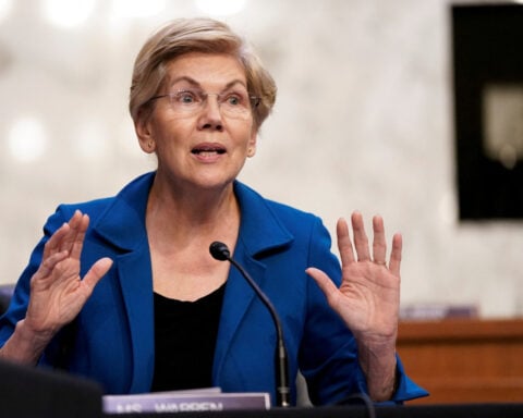 US lawmakers including Sen. Warren push energy regulators to reject acquisition of power company AES