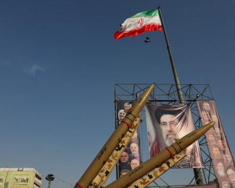 US imposes sanctions on 13 tied to Iran weapons procurement