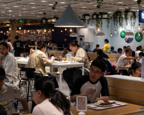 China services growth hits three-month high, private PMI shows