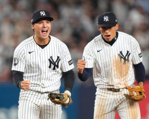 Schlittler and Rice torment hometown team as Yankees beat rival Red Sox 9-0 in playoff opener