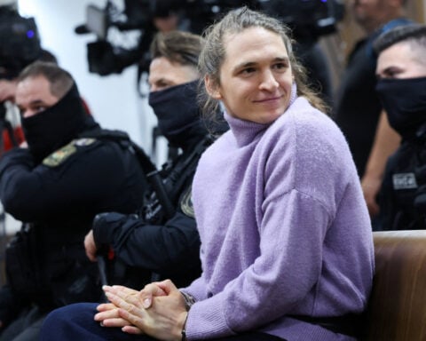 Hungarian appeals court cuts German activist's jail term to seven years