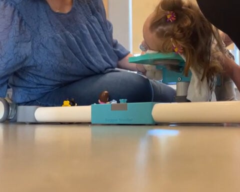 Physical therapist creates affordable crawling device for children with disabilities