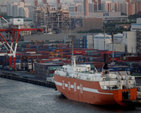 Japan's patchy business mood takes pressure off BOJ for immediate hike
