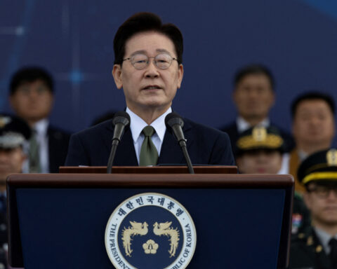 South Korea's Lee urges North Korea to restore dialogue, pledges military buildup
