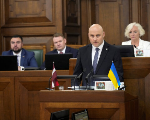 Latvia's Kulbergs eyes election win as Russia divides society