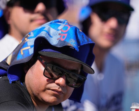 Blazing triple-digit heat bears down on Braves-Dodgers NLDS opener in Los Angeles