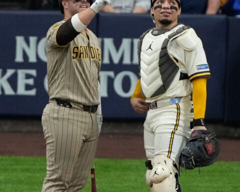 Brewers get a big assist from their ballpark roof to beat the Padres 3-2 in NLDS opener