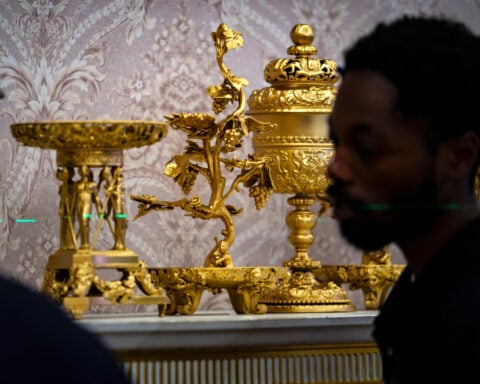 A replica Oval Office near the White House just got a new Trump makeover. Gold flourishes abound