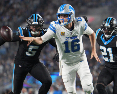 Bryce Young and Tetairoa McMillan connect for 2 TDs to lead Panthers past Lions 32-26