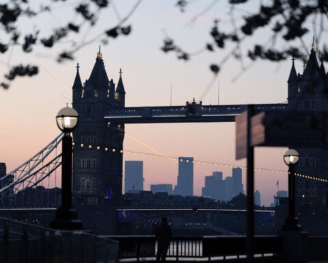 UK services firms suffer surge in costs, raise prices, PMI shows
