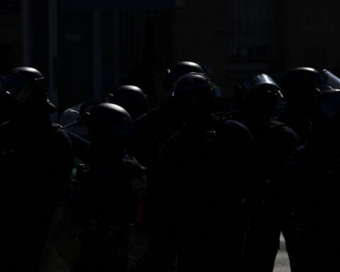 Teenager has hand blown off during French school protests, official says