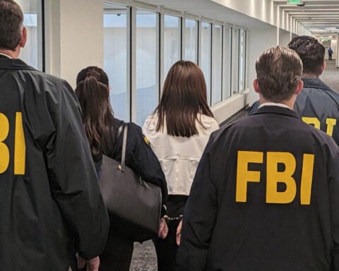 FBI arrests California woman accused of spying on Taiwan leader's family for China
