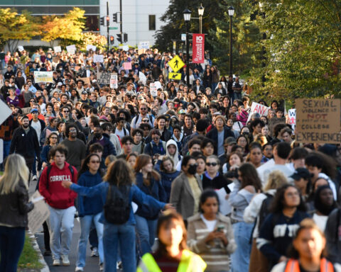 A crowd of students protests Cornell's response to gang rape complaint