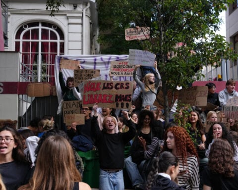 Protesting pupils blockade French high schools again, testing a weekslong movement