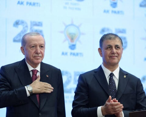 Mayor of Turkey's secular stronghold Izmir joins Erdogan's party
