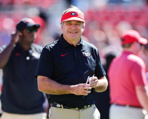 Tropical storm threat churns planning for Georgia-Alabama game with Trump set to attend