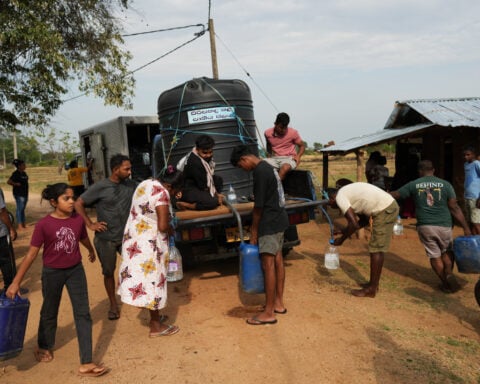 In drought-stricken Sri Lanka, farmers watch wells empty and wildlife crowd shrinking water holes