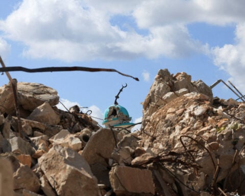 Drones, explosions and soldiers in bulldozers: surrounded by Israelis in Lebanon's 'model town'