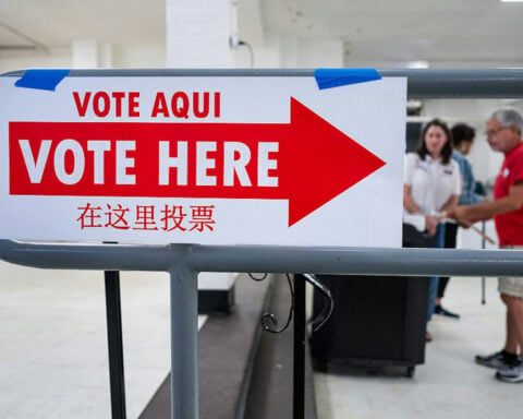 What the law says about armed officers at polling places