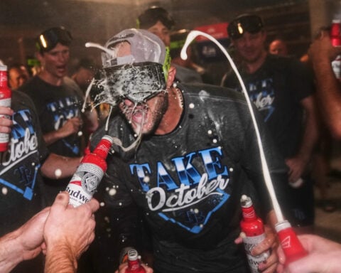 Singing `New York, New York,' Rays revel in recognition as they head to AL Championship Series