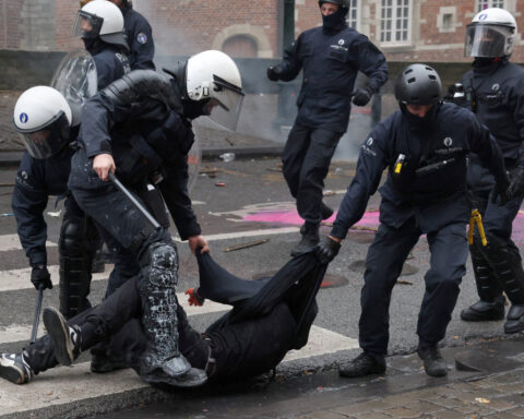 Protesters clash with police in Brussels as unions and students march