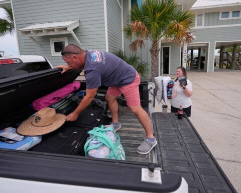 The Latest: Hurricane Isaias strengthens to a Category 3 ahead of expected landfall
