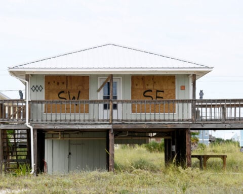 Residents board up windows and National Guard troops deploy as Hurricane Isaias nears US Gulf Coast