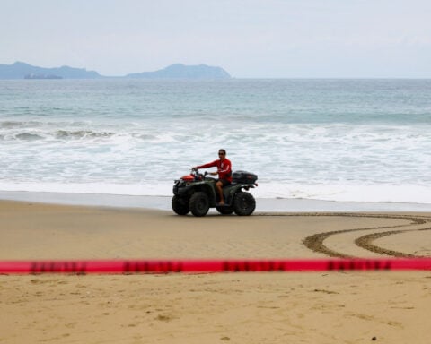 Hurricane Simon strengthens off Mexico's Pacific coast, threatens tourist region