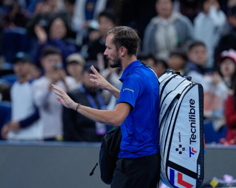 Medvedev advances at Shanghai in 1st match since disqualification. Mustached Alcaraz wins opener