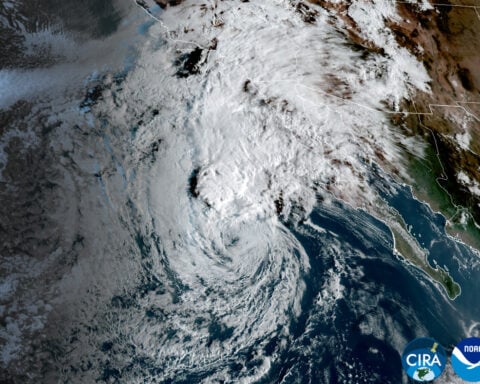 Post-tropical storm lashing southwest with coastal flooding, heavy rain and strong winds