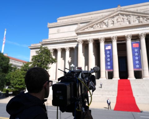 DOJ says it's investigating whether White House TV pool's coverage halt violated antitrust law