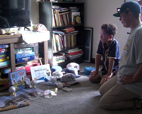 ‘He just gets to be a kid’: Brewers games bring comfort to 9-year-old who lost both parents