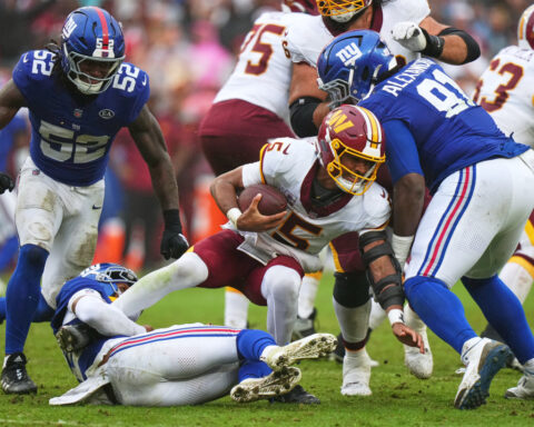 Jayden Daniels returns and scores twice, but overtime gaffe costs Commanders in 27-27 tie vs. Giants
