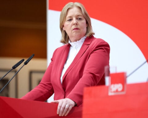 Germany's fragile coalition hit by labour minister's resignation