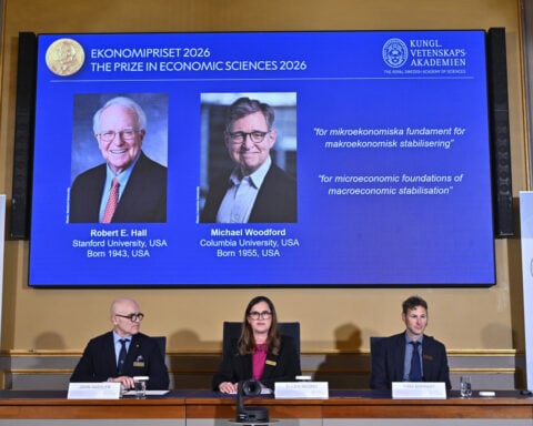 2 American economists win Nobel for work on managing economic shocks