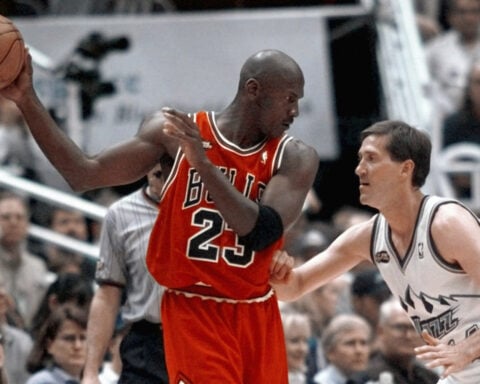 Michael Jordan jersey sets $14 million record for basketball memorabilia, auction house says