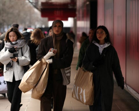 UK shoppers stay cautious as fuel costs bite, surveys show