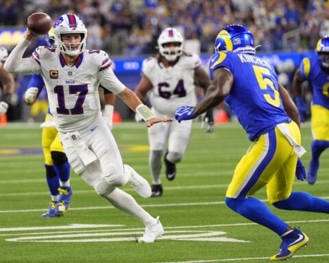 Josh Allen racks up 331 yards and Bills outlast Rams with help from blocked FG for 37-34 win in OT